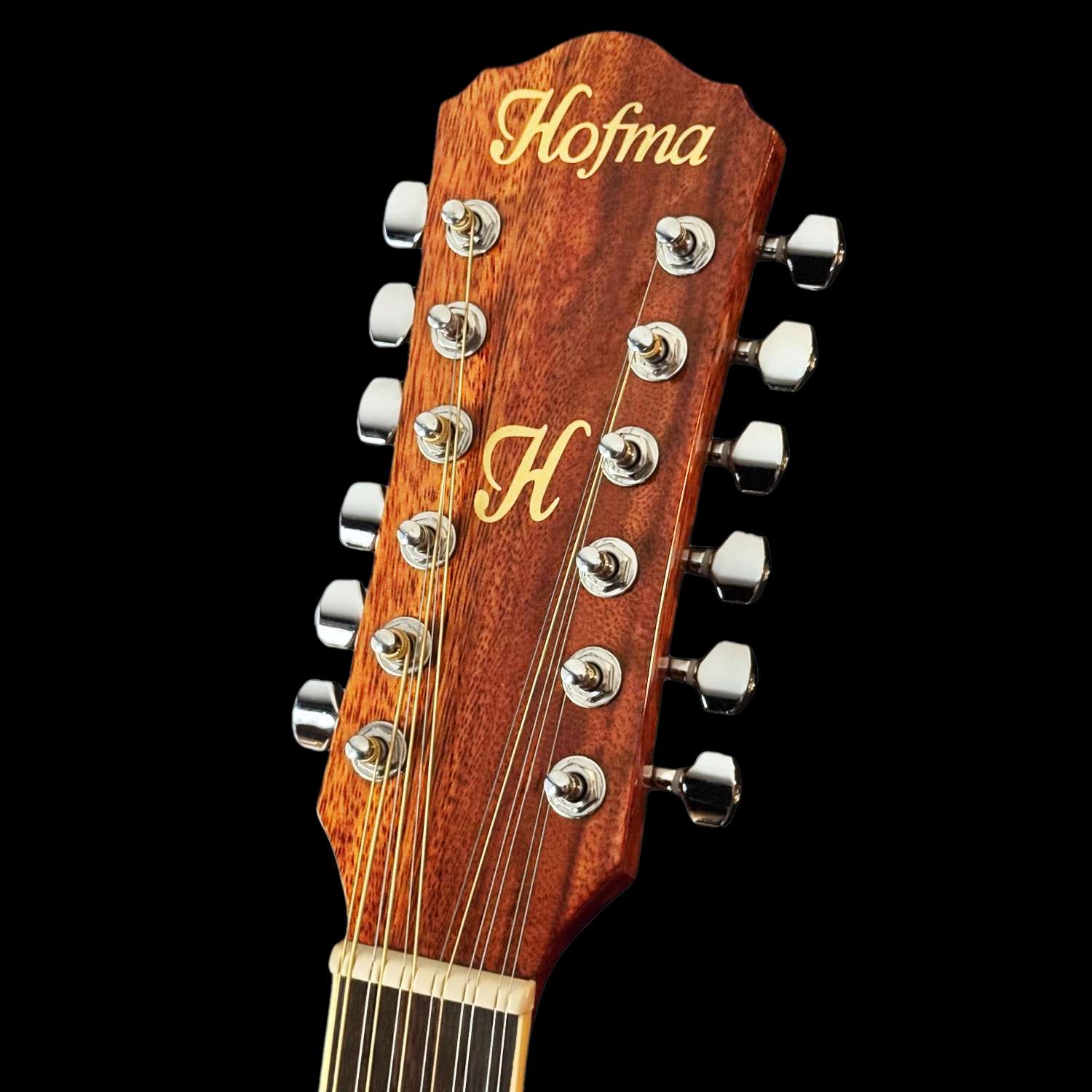 he215e12-violao-12-cordas-hofma-natural-brilhante-detalhe01 he215e12 violao 12 cordas hofma natural brilhante detalhe headstock